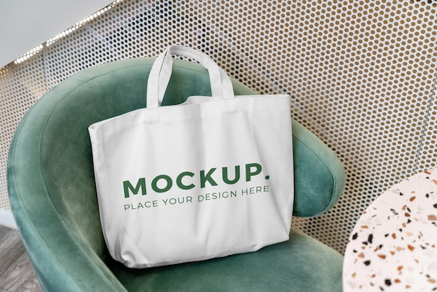 PSD a tote bag mockup on a chair