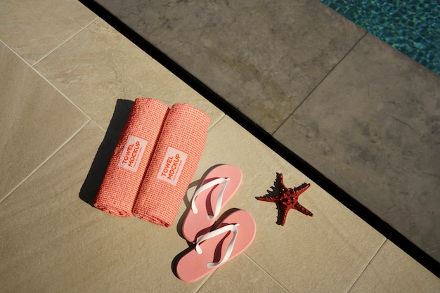 PSD towel mockup by the swimming pool