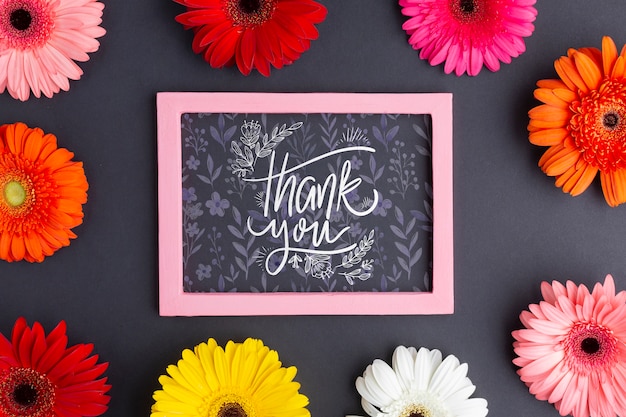 Tpo view of chalkboard and colorful flowers