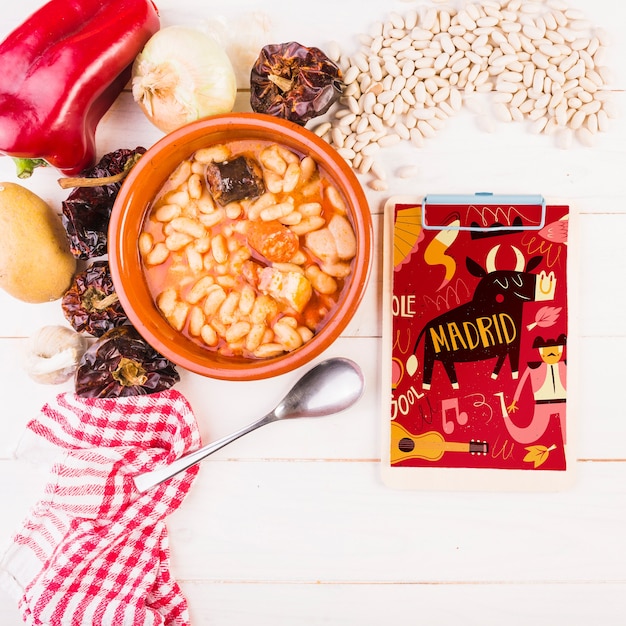 Traditional spanish food mockup with clipboard