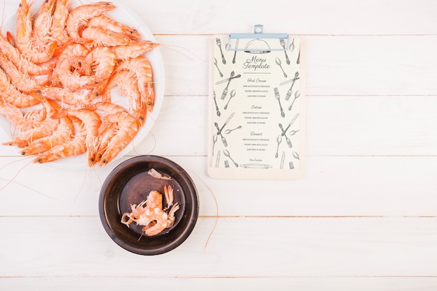 Traditional spanish food mockup with clipboard