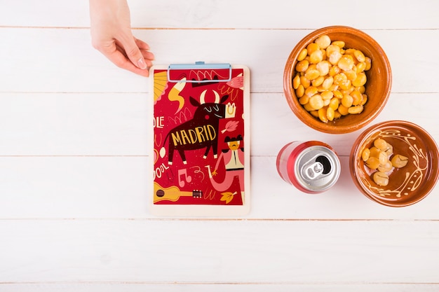 PSD traditional spanish food mockup with clipboard