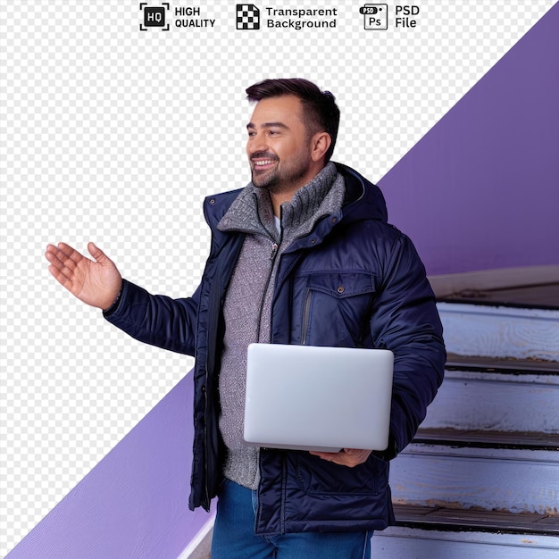 Transparent background with isolated greetings joyful man in blue jacket and jeans holding a white laptop standing in front of a purple wall with dark hair and a raised hand png psd