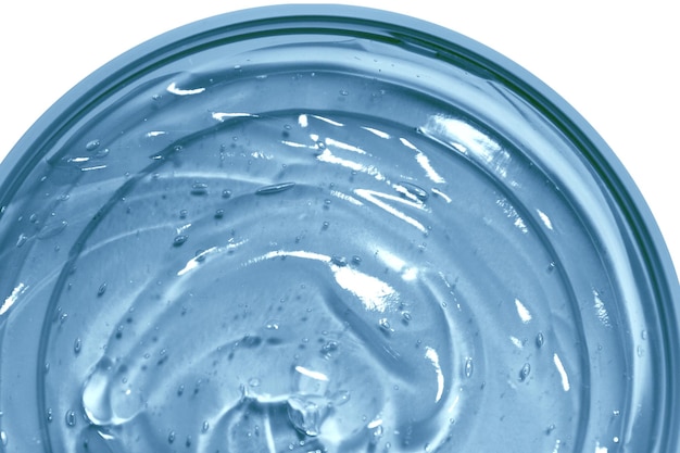 PSD transparent blue cosmetic gel in a round jar view from above on an empty background