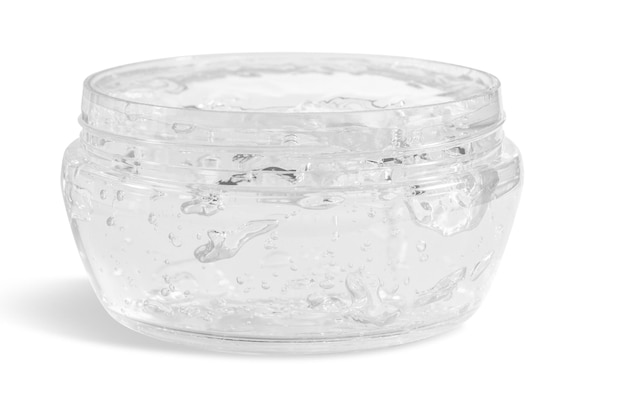 PSD transparent cosmetic gel with a transparent jar on an empty background