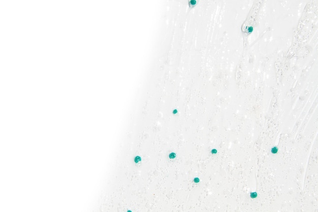 Transparent gel with blue granules smeared serum on the background png