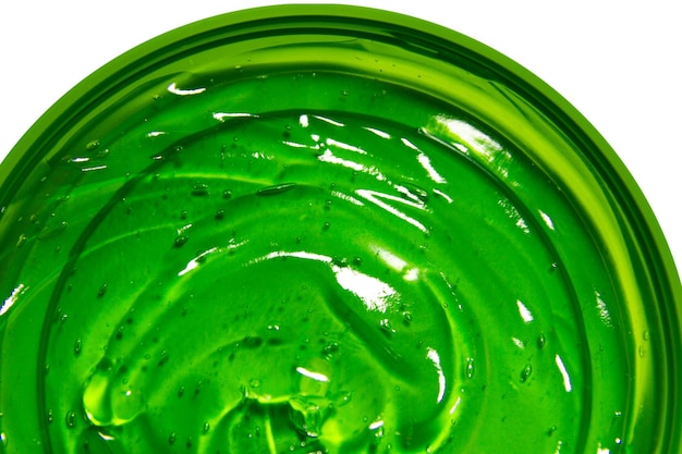 PSD transparent green cosmetic gel in a round jar on an empty background