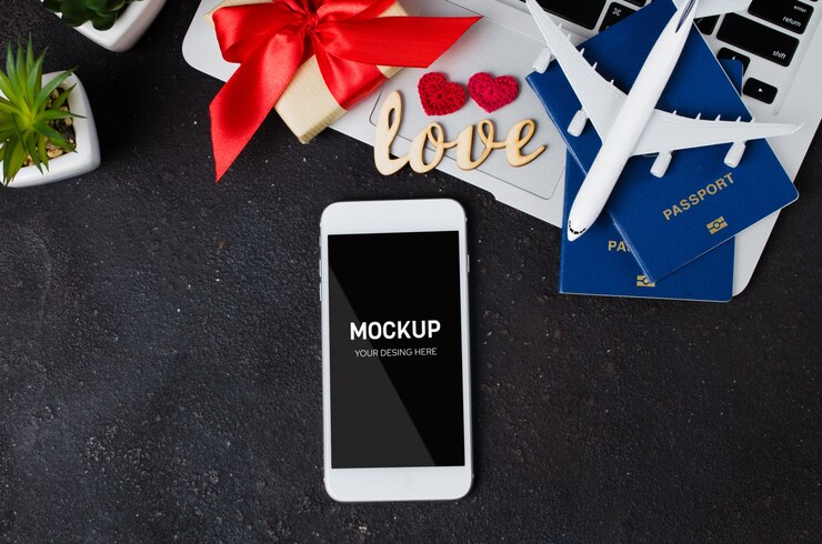 PSD travel booking with smartphone, airplane model, laptop, passports and gift box