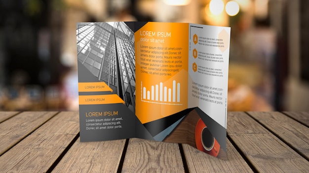 Trifold brochure mockup on tabletop