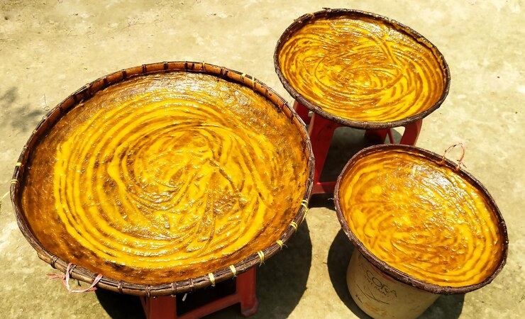 PSD turmeric drying in circular formations on bamboo trays