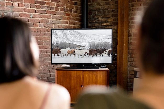 TV screen mockup couple relaxing psd