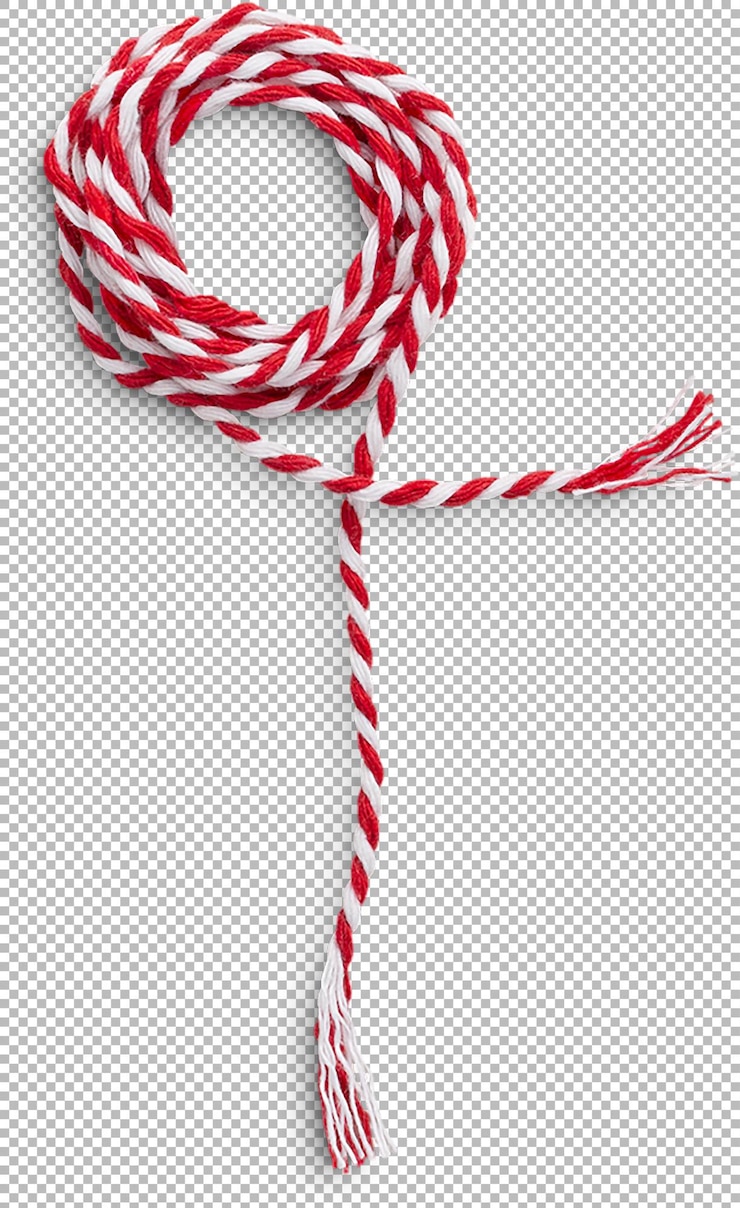 PSD a twisted red and white rope coiled neatly possibly used for tying or decoration