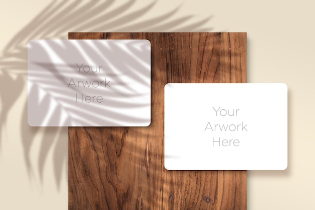 Two Greeting Card Paper Mockup Flat Lay with leaves shadow