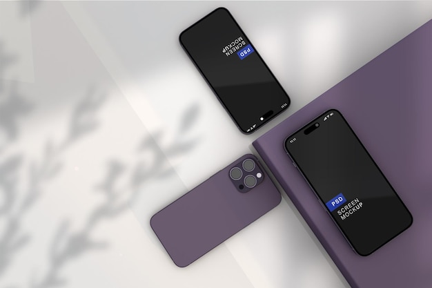 Макет двух современных фиолетовых мобильных телефонов