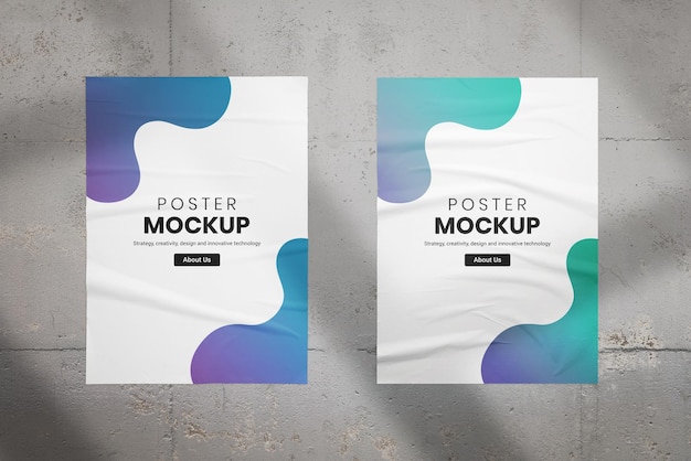 Two poster mockups on the wall lit by natural window light