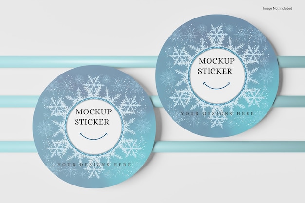 PSD two round labels with snowflakes on them that say's a sign that says'mockup sticker '