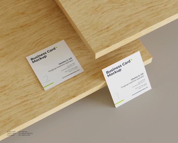 Two square business cards mockup one on above wood and one under