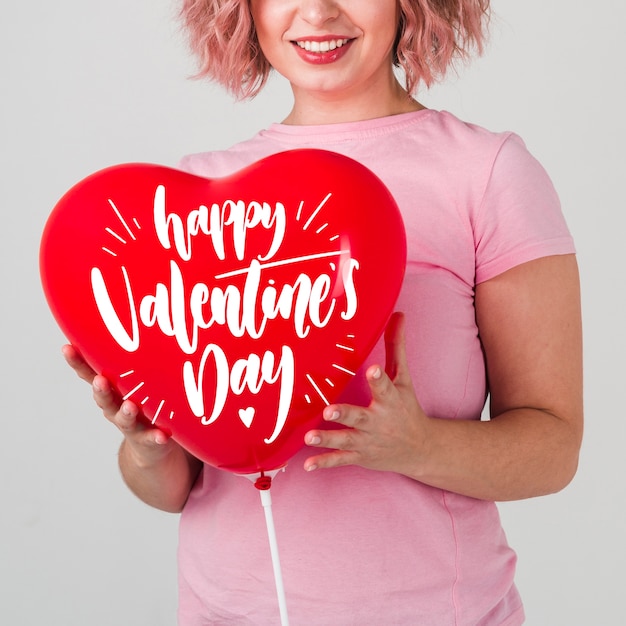 Valentine's day concept mock-up with smiling woman