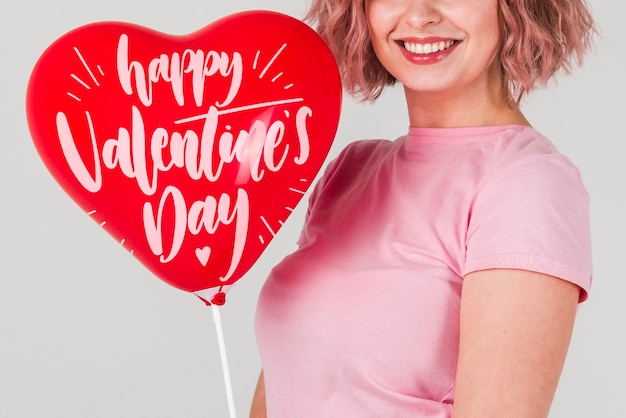 valentine's day concept mock-up with smiling woman