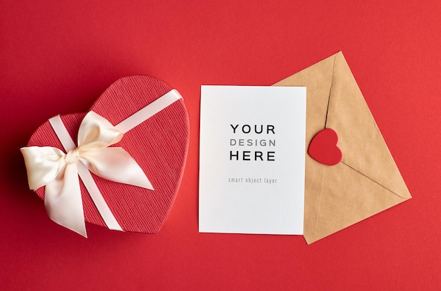 Valentines day card mockup with envelope and heart gift box on red