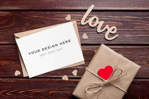 PSD valentines day card mockup with gift box and hearts decorations