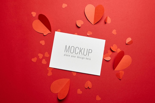 Valentines day card mockup with red paper hearts