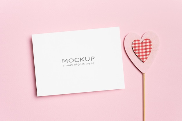 Valentines day greeting card mockup with heart on pink