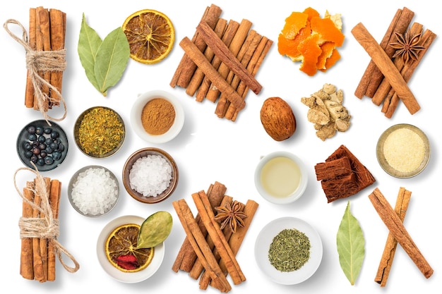 A variety of spices including cinnamon, cinnamon, nutmeg, cinnamon, and other spices.