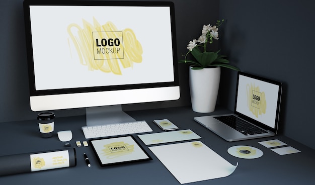 Vari elementi di branding e mockup di dispositivi