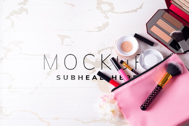 Various makeup products on marble table