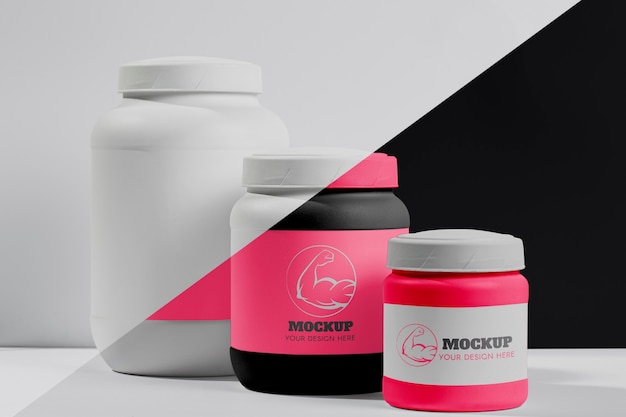 Various pink fitness protein powder and pills