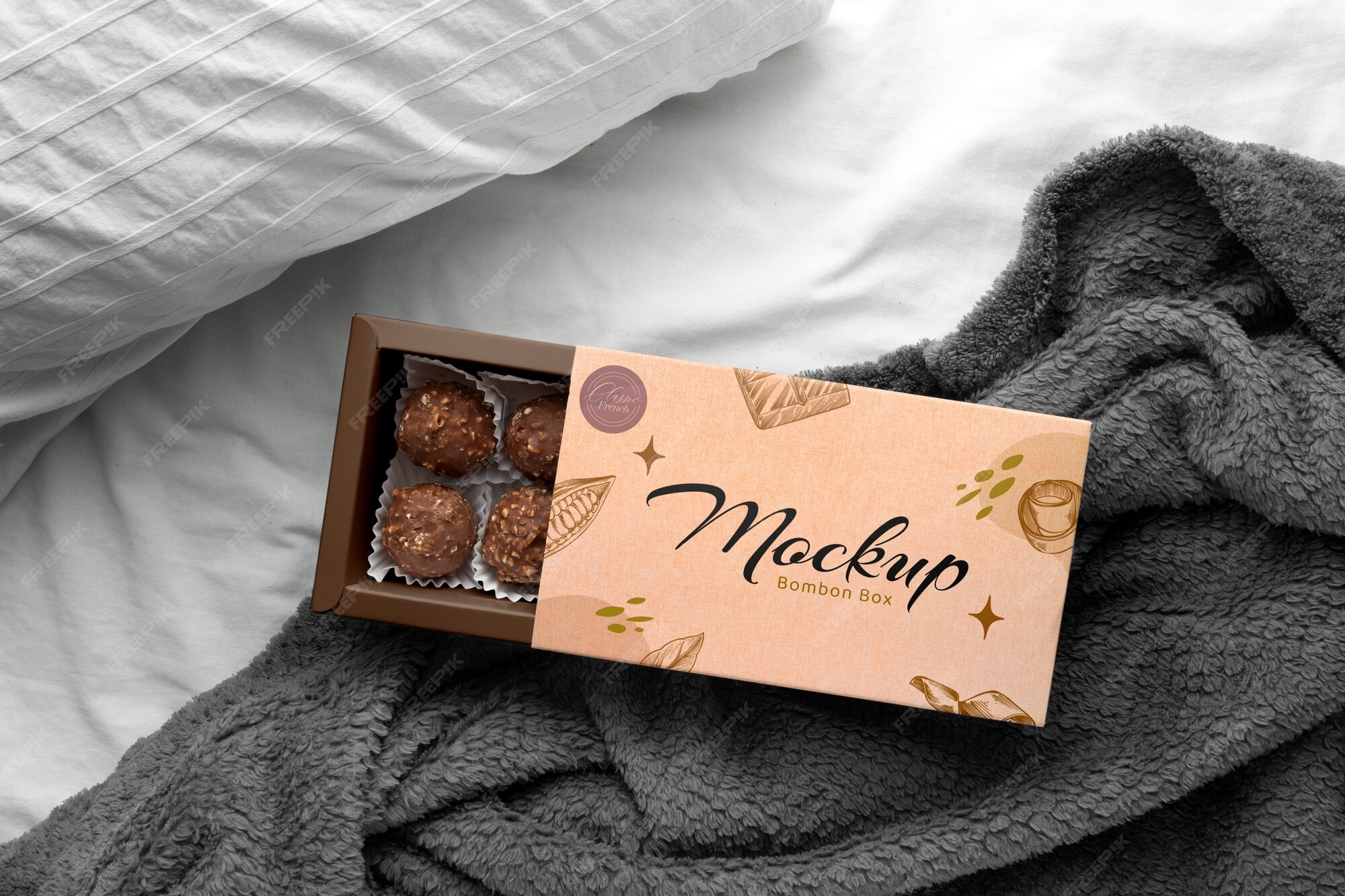 Premium PSD | View of cardboard candy box with bed background