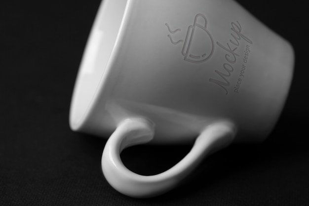 PSD view of ceramic cup with engraved mock-up design