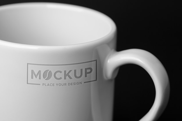 PSD view of ceramic cup with engraved mock-up design