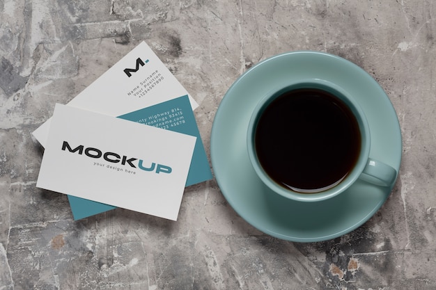 View of coffee cup with professional business card mock-up