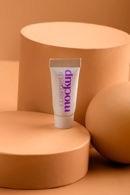 PSD view of cosmetic product with apricot color background