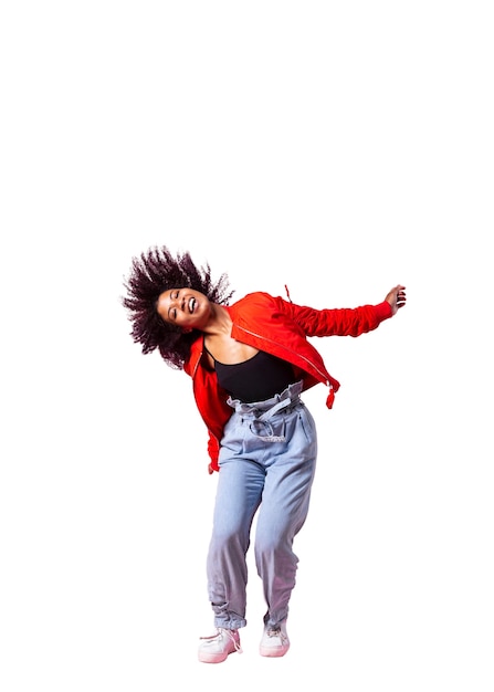 View of happy woman jumping in mid-air