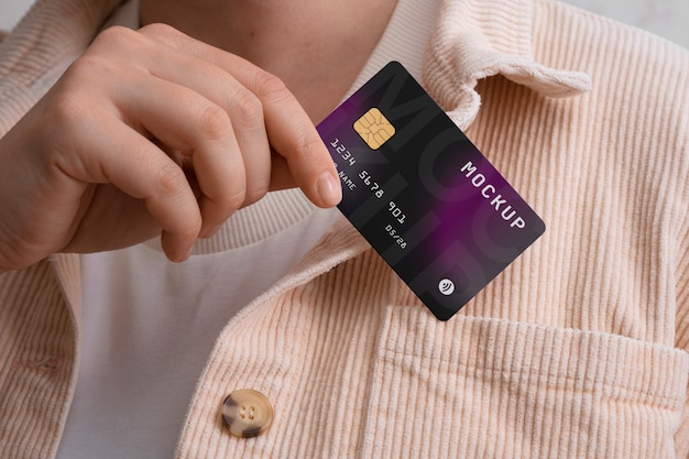 PSD view of person using credit card mock-up design