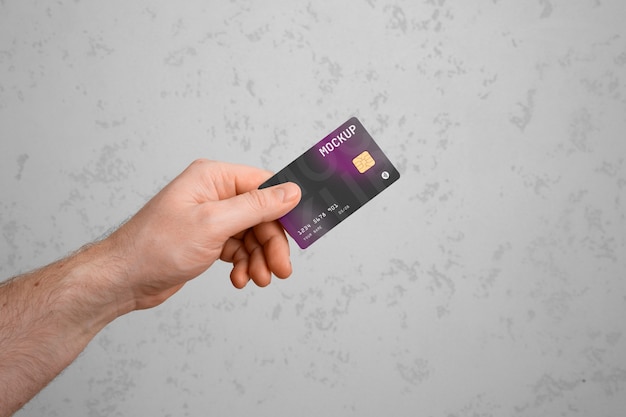 PSD view of person using credit card mock-up design