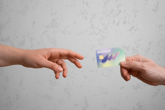 PSD view of person using credit card mock-up design