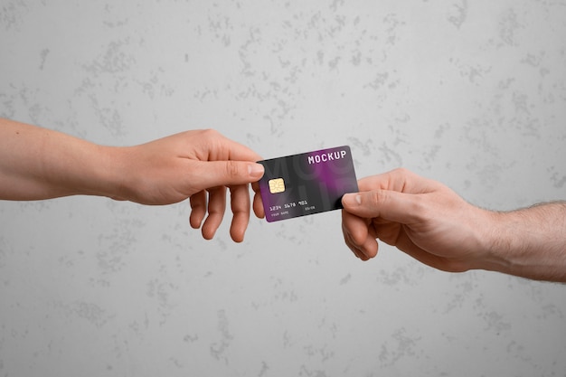 PSD view of person using credit card mock-up design