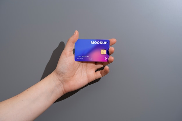 PSD view of person using credit card mock-up design