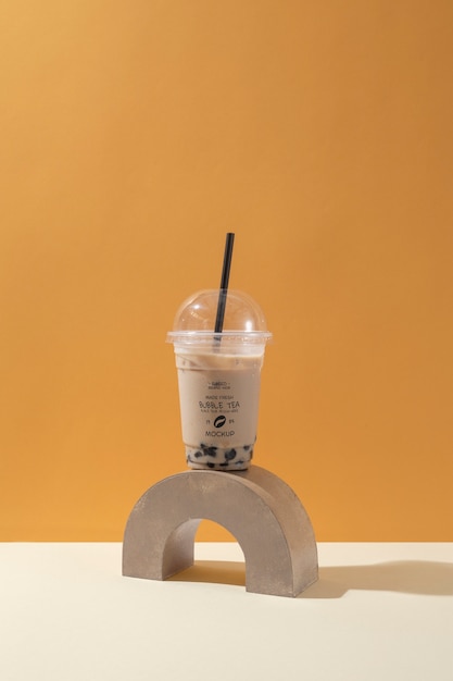 PSD view of plastic cup with bubble tea and straw