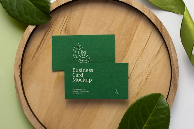 above view stationery with wood and plant