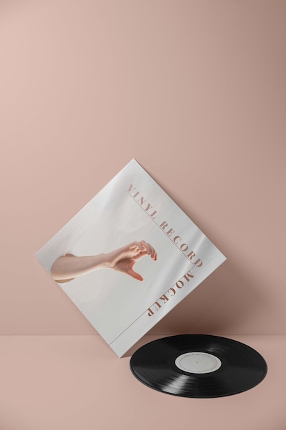 PSD disco in vinile con mockup di sfondo rosa