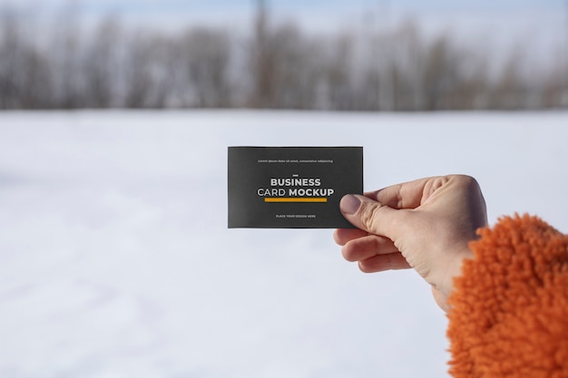 Visit card mockup outdoor in snow