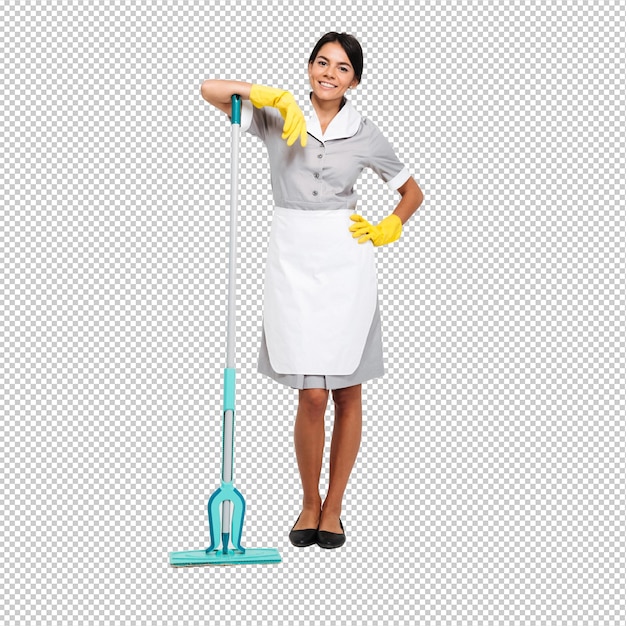 Volledige foto van een aantrekkelijke brunette dienstmeisje in uniform die op een mop leunt terwijl ze staat