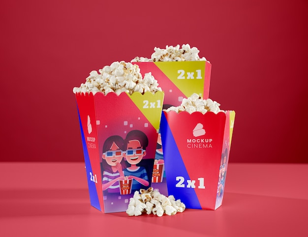 Vooraanzicht van drie kopjes bioscoop popcorn