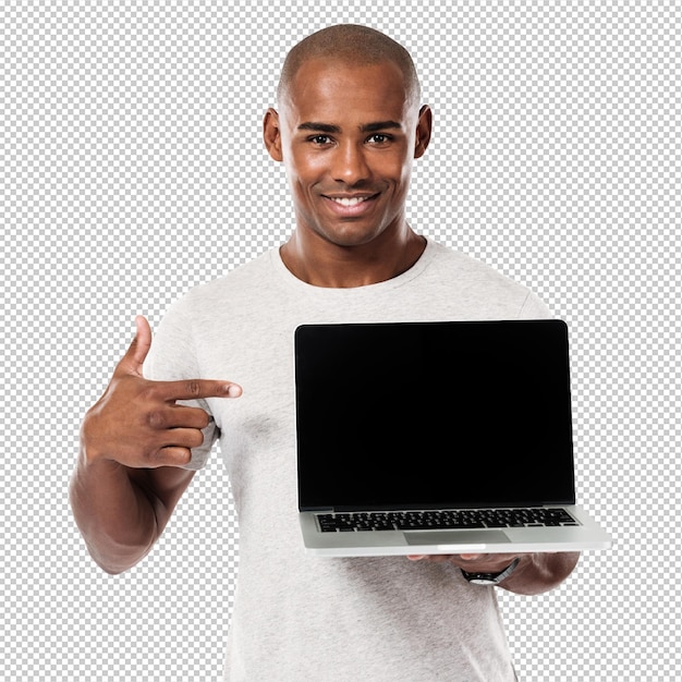 Vreugdevolle jonge Afrikaanse man die een laptop toont