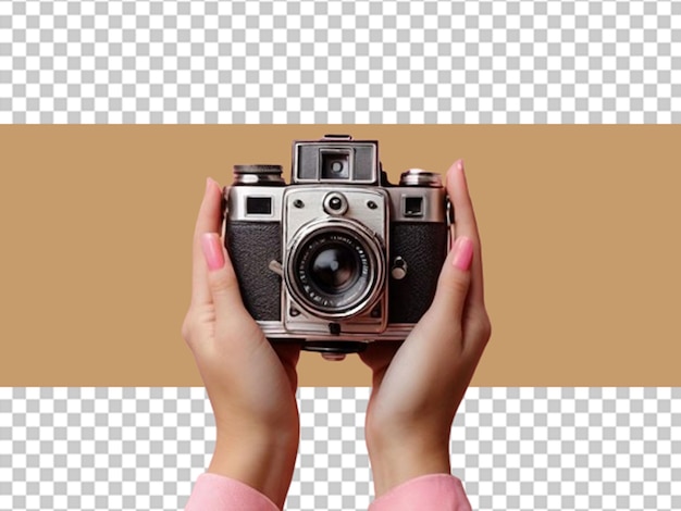 PSD vrouwelijke hand met een roze oude vintage camera world photography day concept